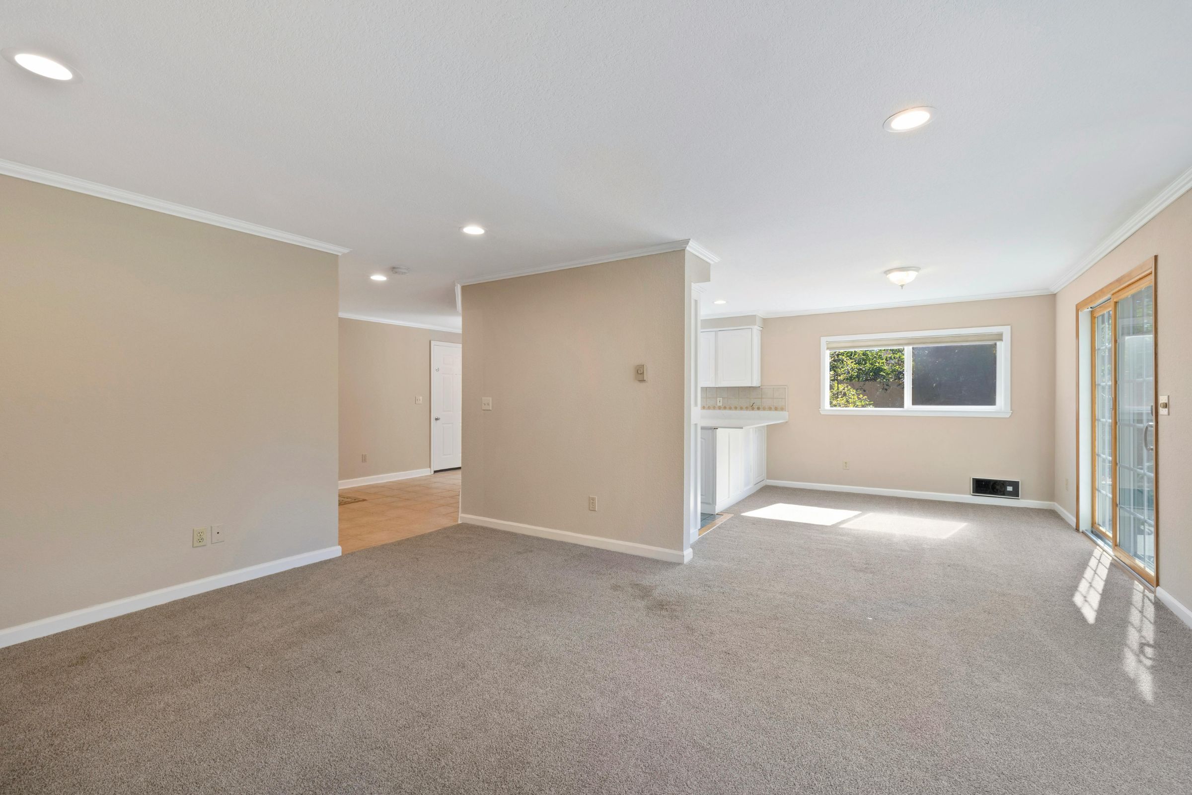 Freshly cleaned carpet in a managed rental property common area